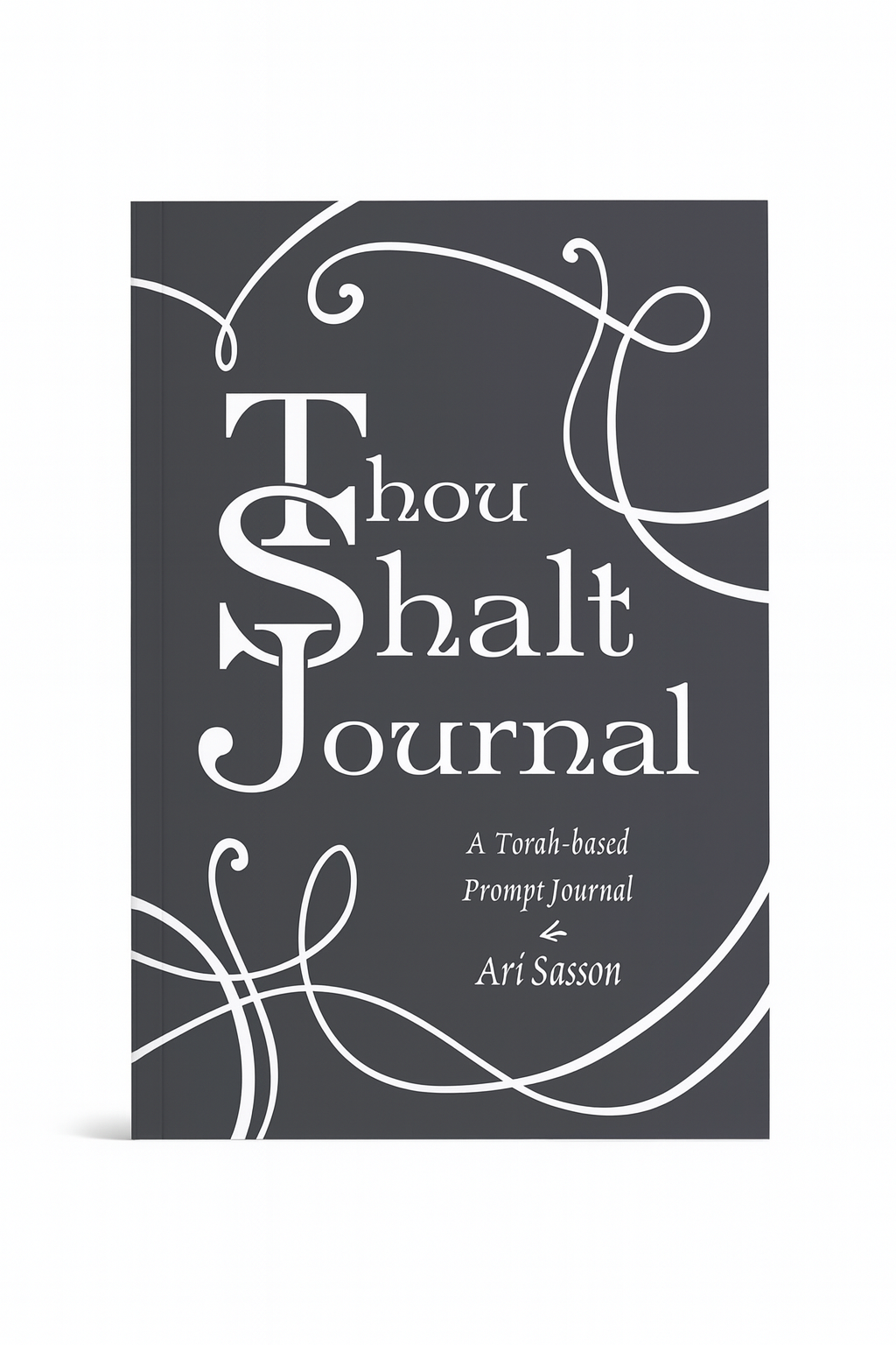 The cover of thou shalt journal. a decorative swirl is featured on the black and white cover
